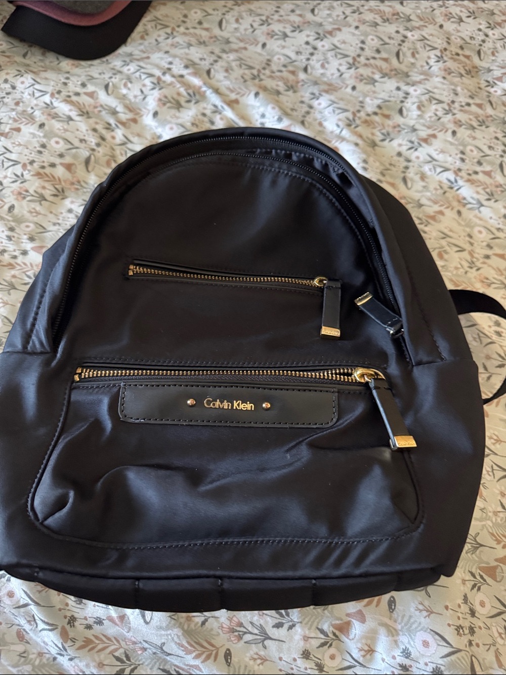 Calvin Klein Black Backpack with Gold Accents